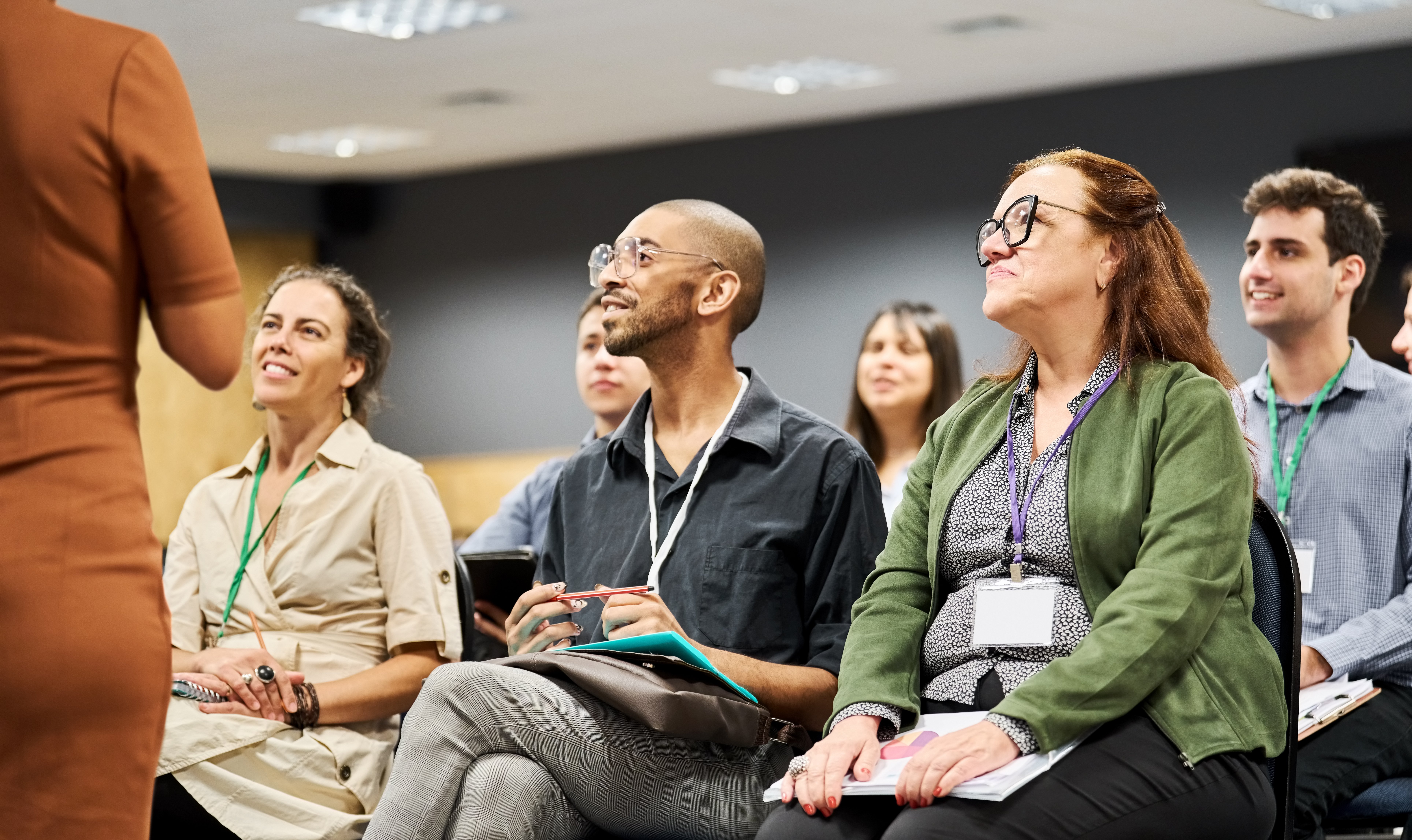 People listening at conference