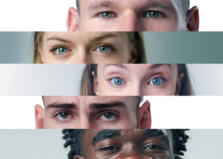 Diverse group of individuals with striking blue eyes showcasing unity and connection