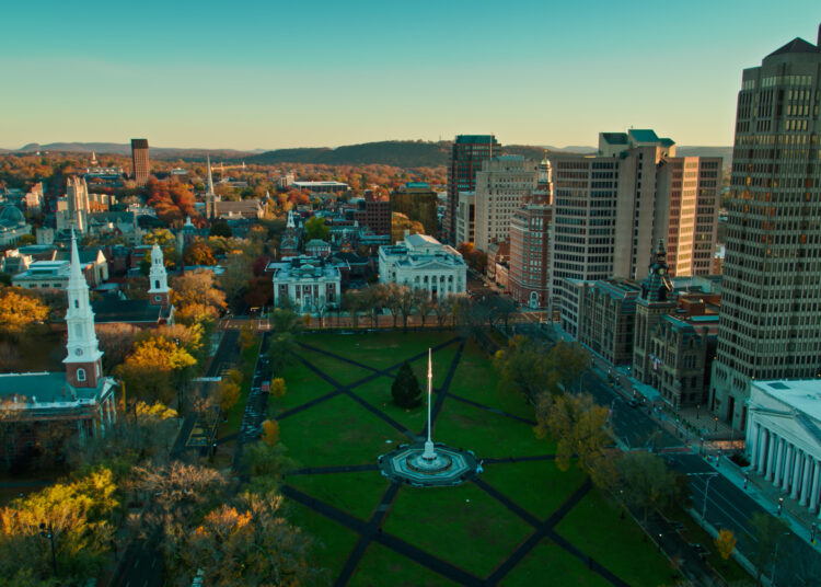 Aerial shot of New Haven, Connecticut at sunrise on a Fall morning.